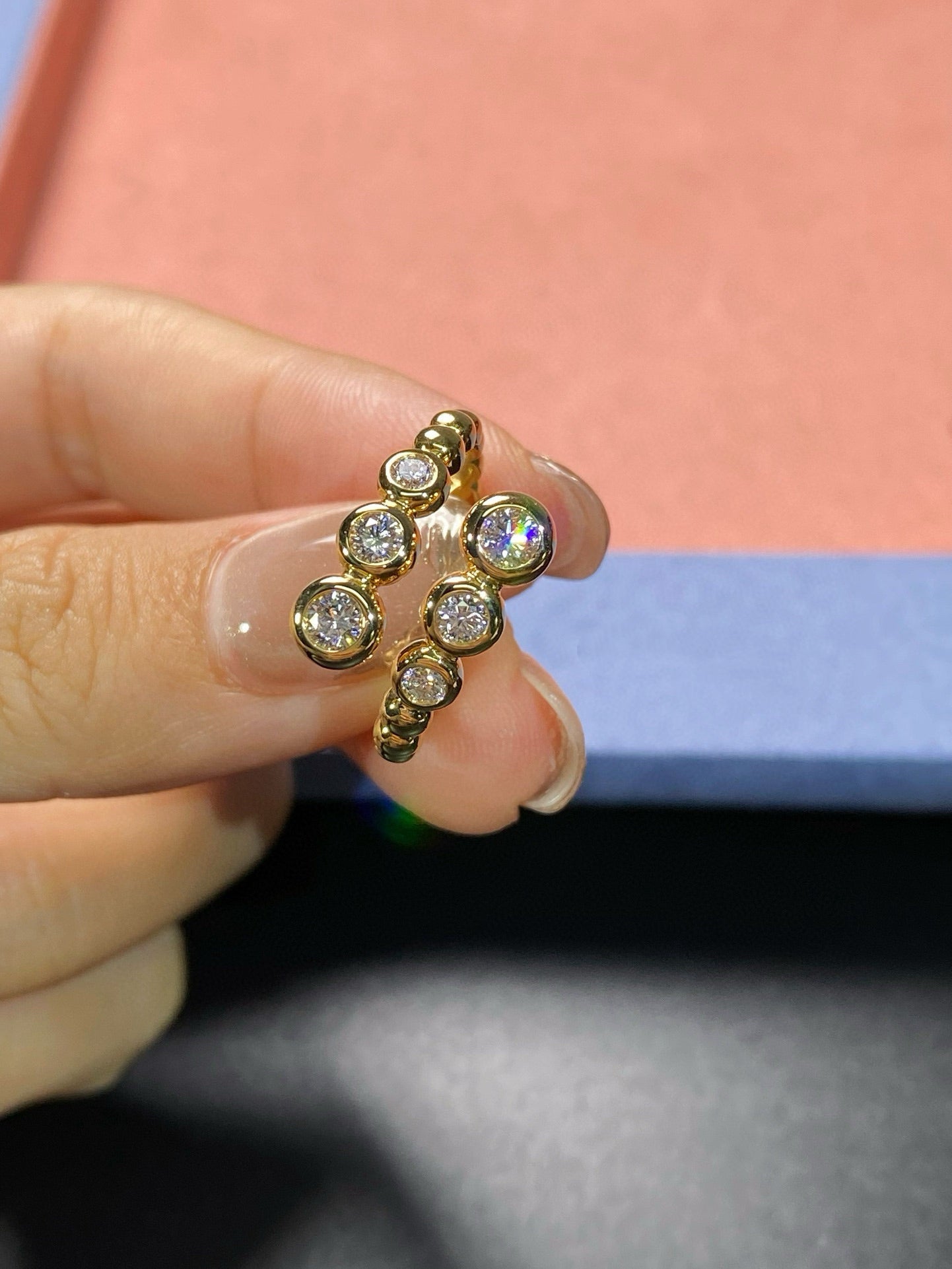 Graduated Bezel Diamond Ring