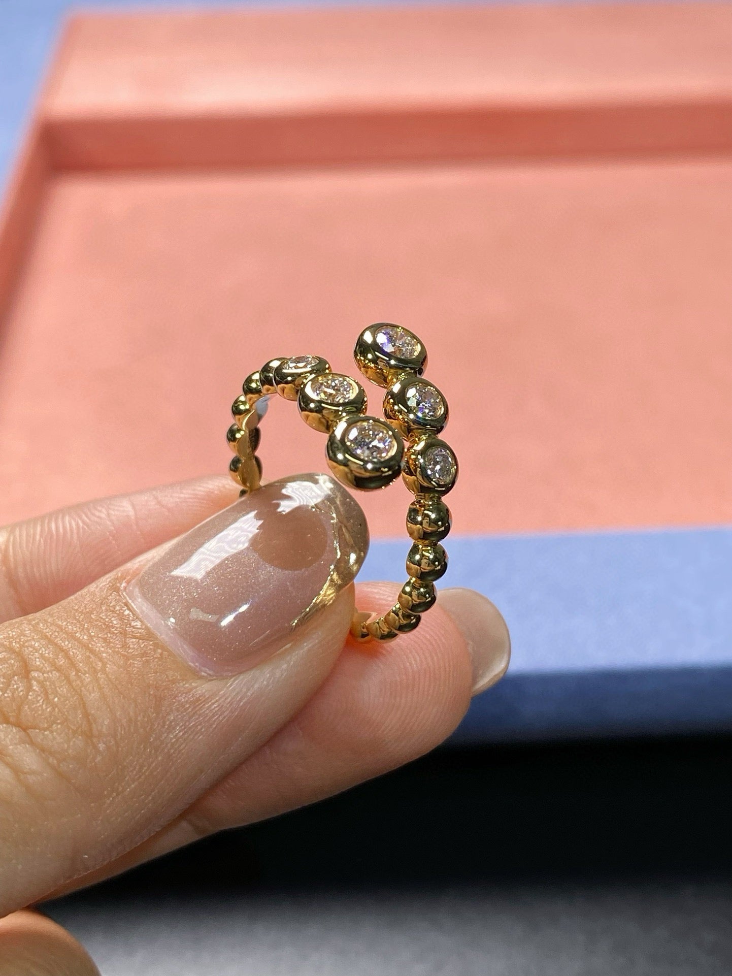 Graduated Bezel Diamond Ring